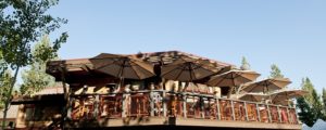 Photo showing the outdoor patio of the Tahoe Donner Lodge on a sunny day