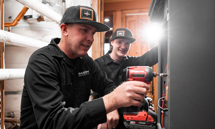 InMotion Mechanical employees working together