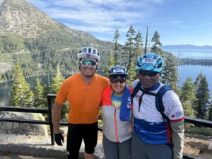 Tahoe Donner members stop for a pic in front of Lake Tahoe during charity bike ride