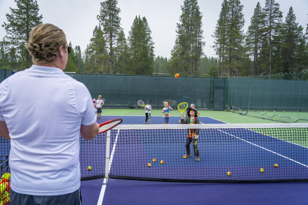 Tennis Day Camp kids in action.