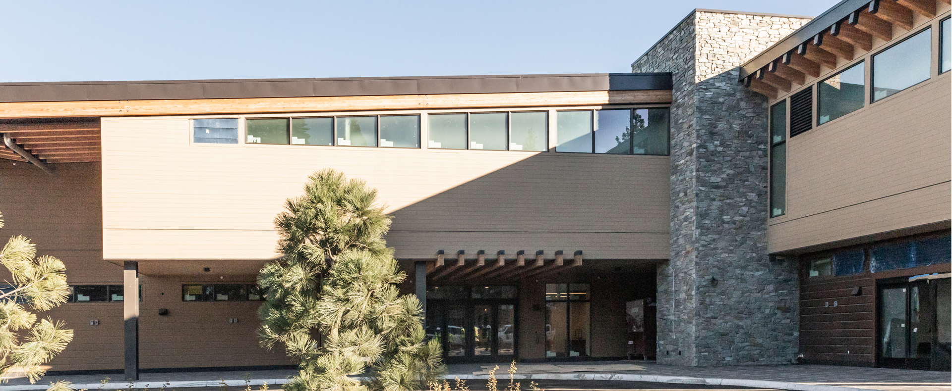 Downhill Ski Lodge Construction; photo of exterior main entrance from October 2025, shot by Cynthia Cendreda